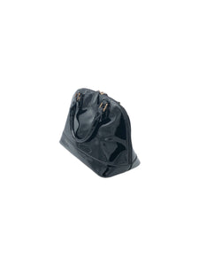 Bolso estilo Duffle marca CanoSitl an en Charol color Negro. De asas. Artículo de doble uso.