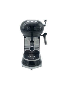 Máquina De Café marca SMEG en Metal, color Negro. Con aditamentos. Artículo de doble uso.