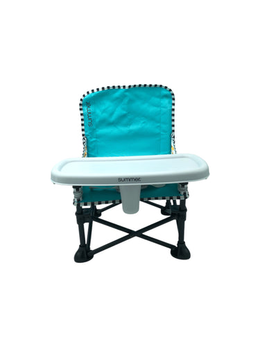 Mini silla infantil Portátil marca Summer en color Azul. Diseñada para bebes y niños pequeños, incluye bandeja extraíble para comida. Artículo de doble uso.