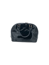 Cargar imagen en el visor de la galería, Bolso estilo Duffle marca CanoSitl an en Charol color Negro. De asas. Artículo de doble uso.