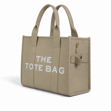 Cargar imagen en el visor de la galería, Bolsa con Leyenda THE TOTE BAG color Beige, Diseño Rectangular y Dos Asas Superiores | Segunda mano