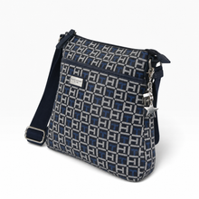Load image into Gallery viewer, Bolsa Crossbody TOMMY HILFIGER, Monograma Azul Marino, Correa Ajustable y Bolsillo Frontal | Segunda mano
